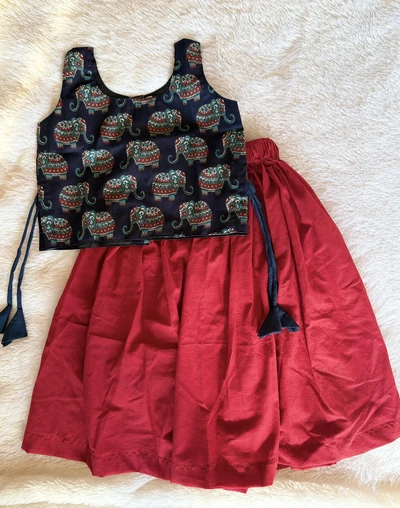 Blue elle and plain red skirt