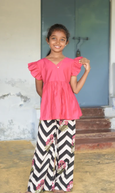 Pink peplum  top and zigzag pant